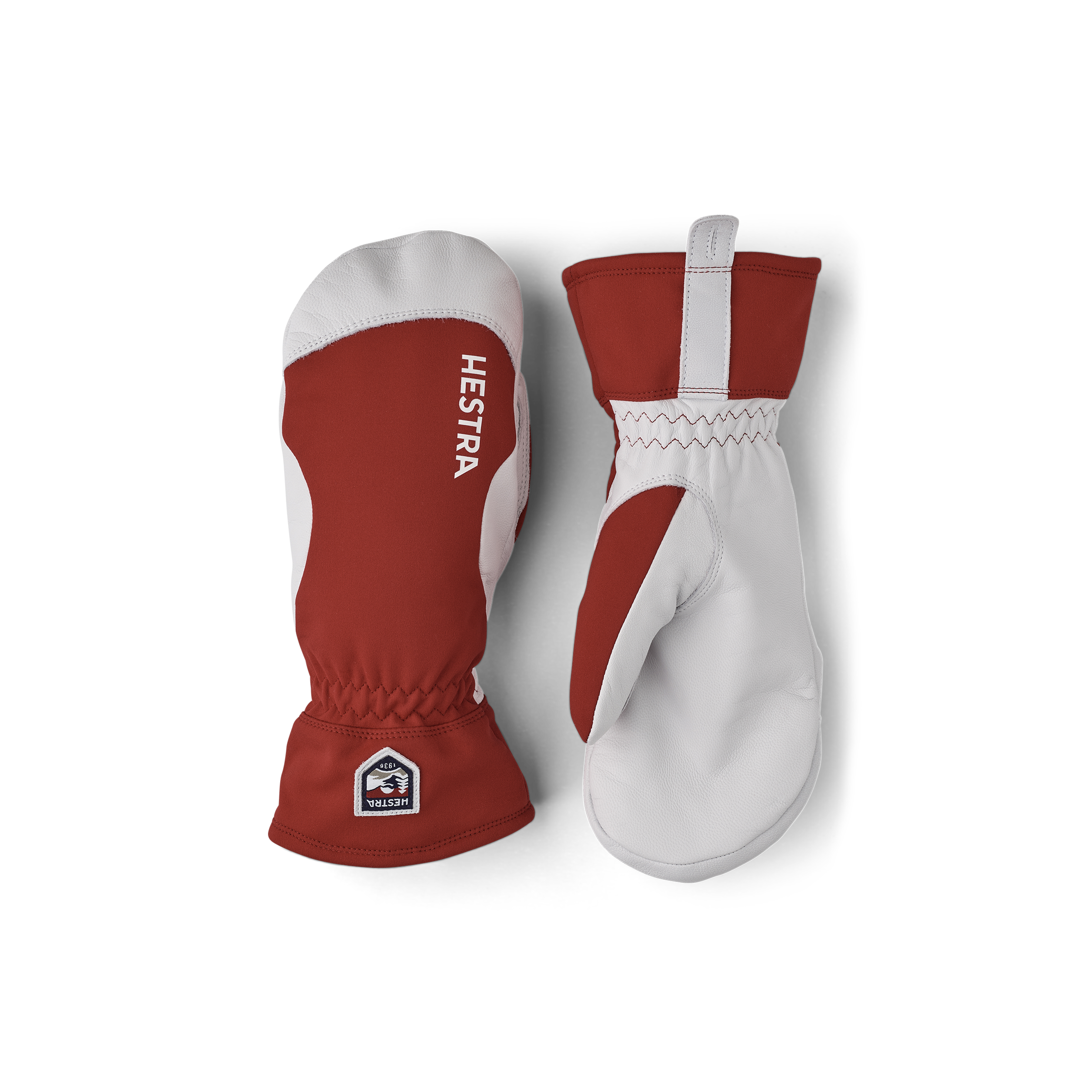 Roter Fausthandschuh mit hellgrauem Ziegenleder an der Innenhand