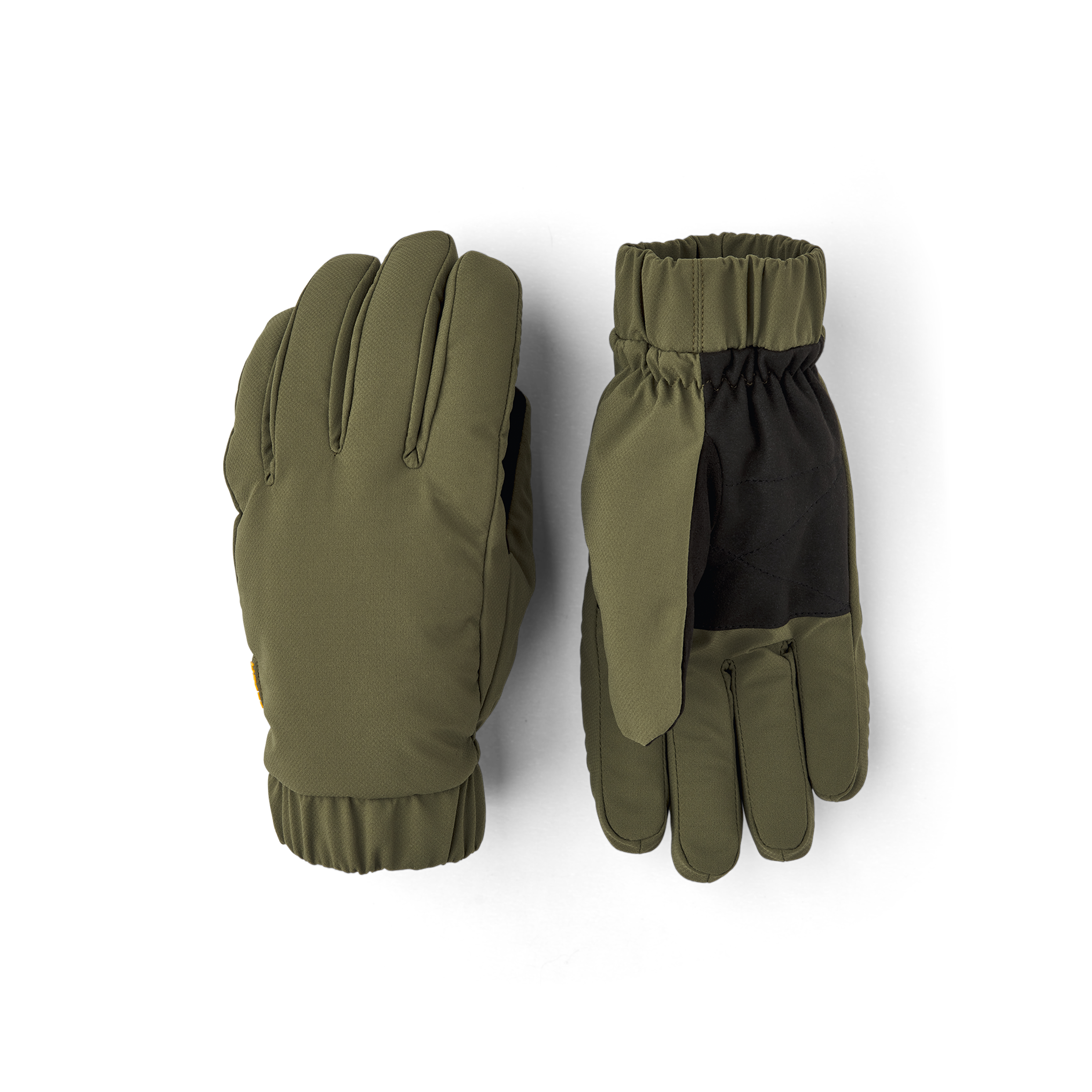 Grüner Stoffhandschuh mit elastischem Stoffbündchen und schwarzer Innenhand