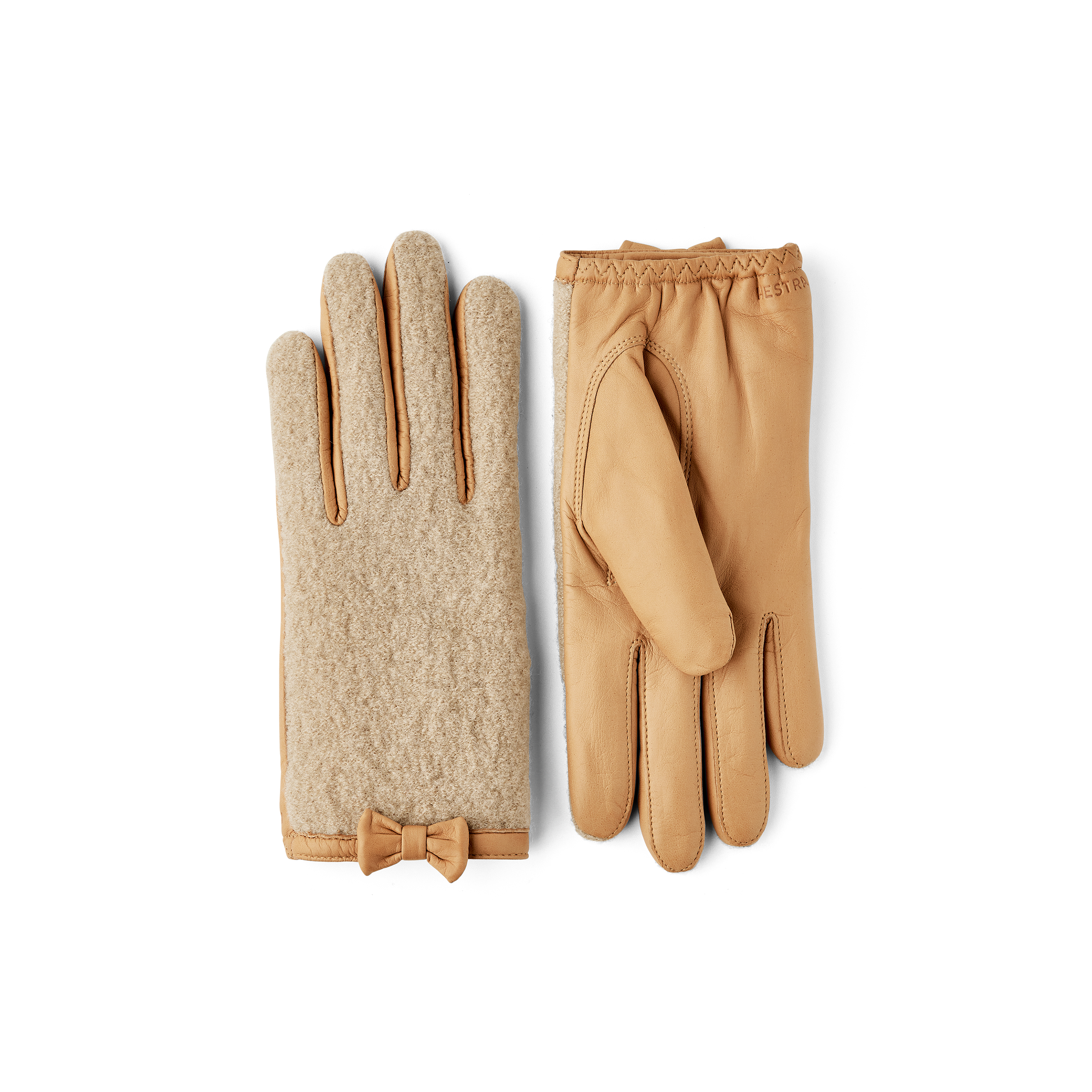 Grüner Lederhandschuh aus Haarschafleder mit Bouclé-Strick auf der Oberhand und kleiner Schleife