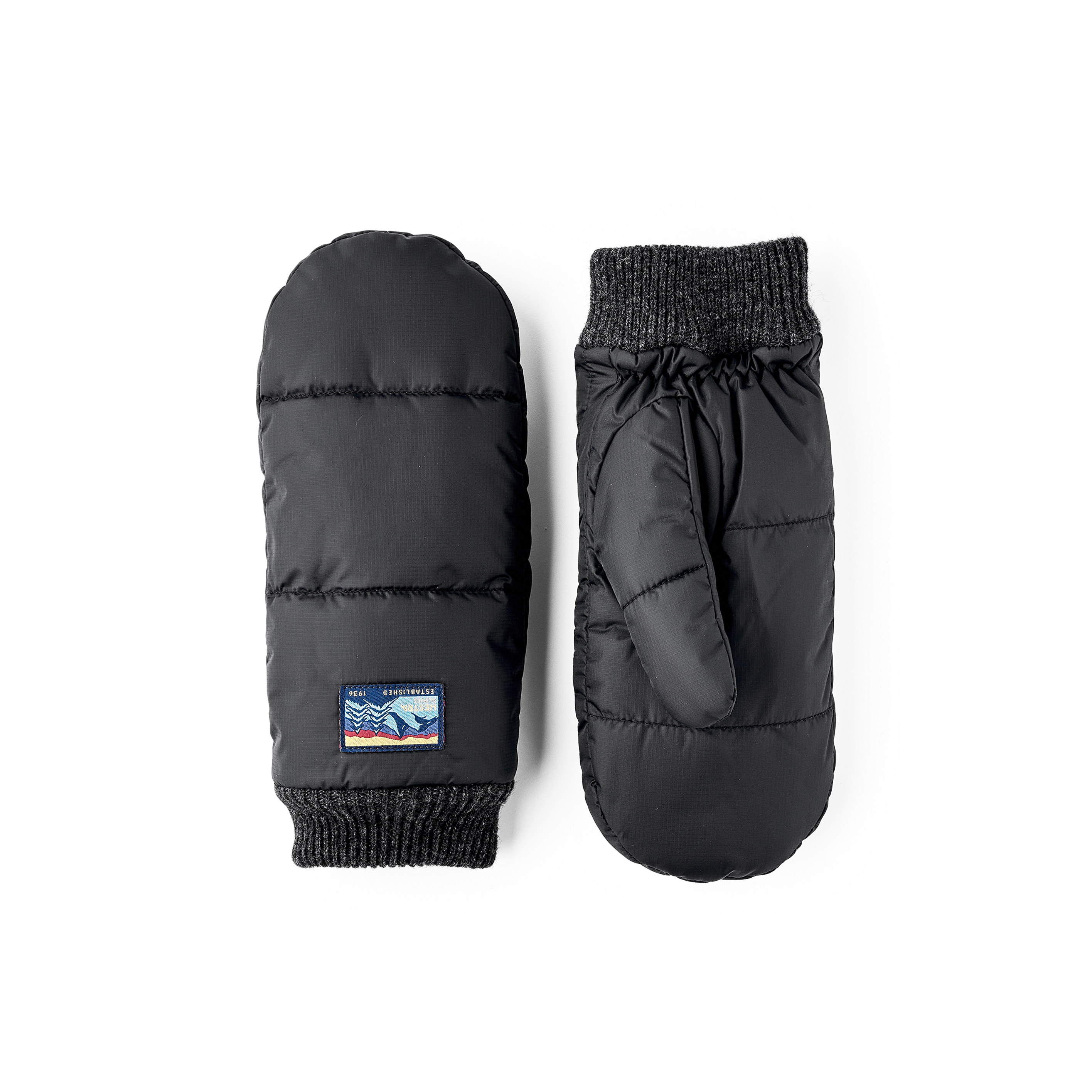 Schwarzer Fausthandschuh aus Stoff mit Strickbündchen