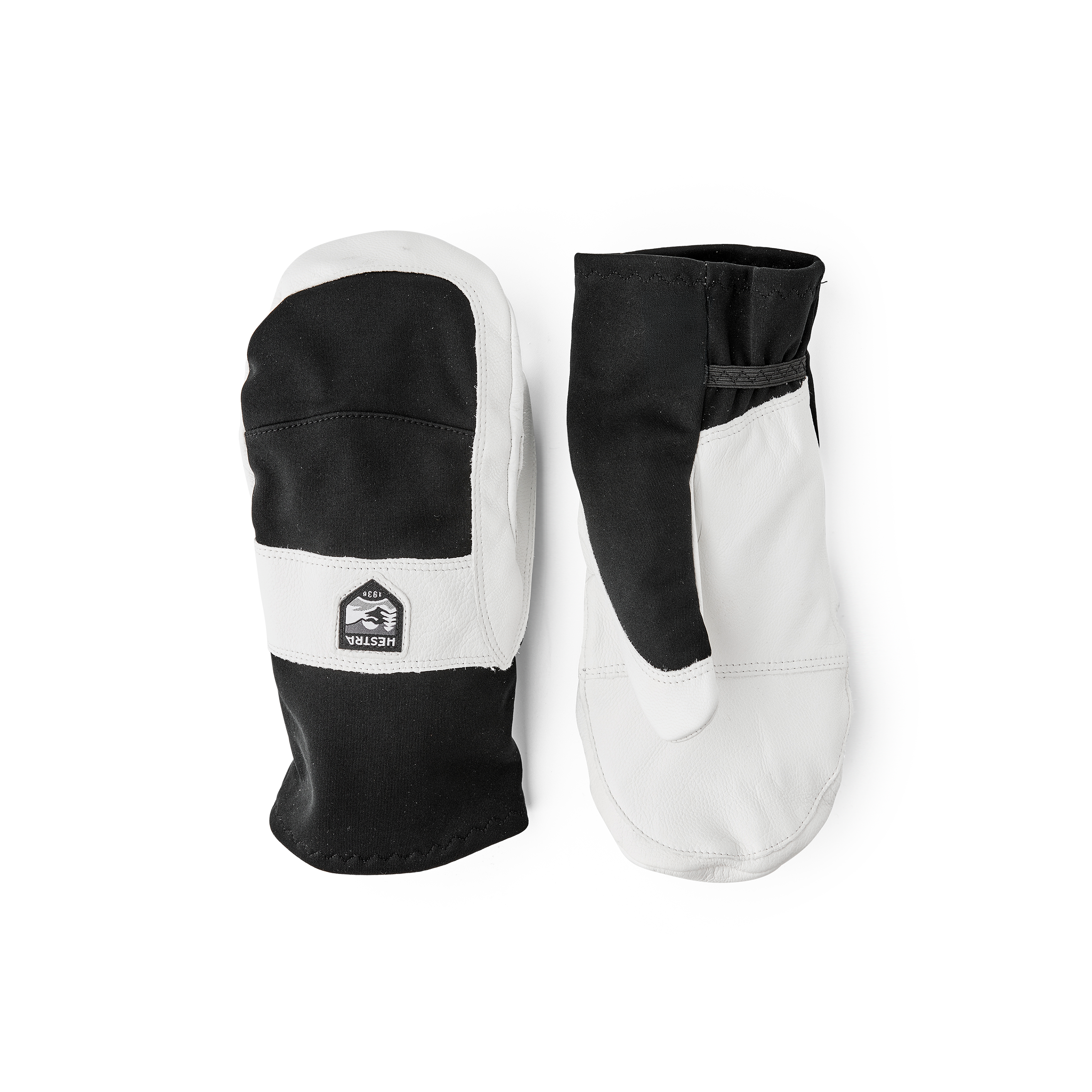 Schwarz-weißer Fausthandschuh mit weißem Ziegenleder an der Innenhand