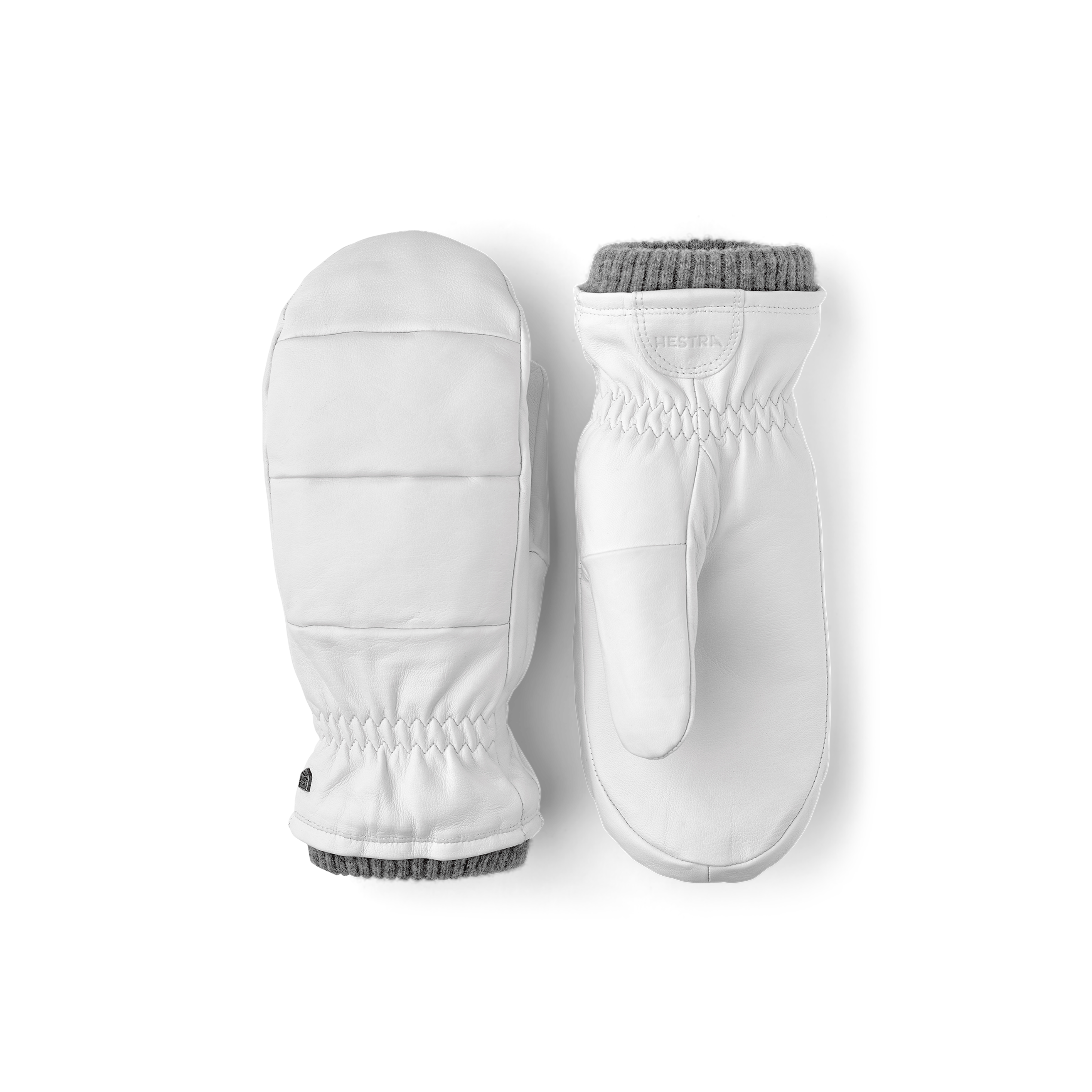 Weißer Fausthandschuh aus Haarschafleder mit kurzem Strickbündchen