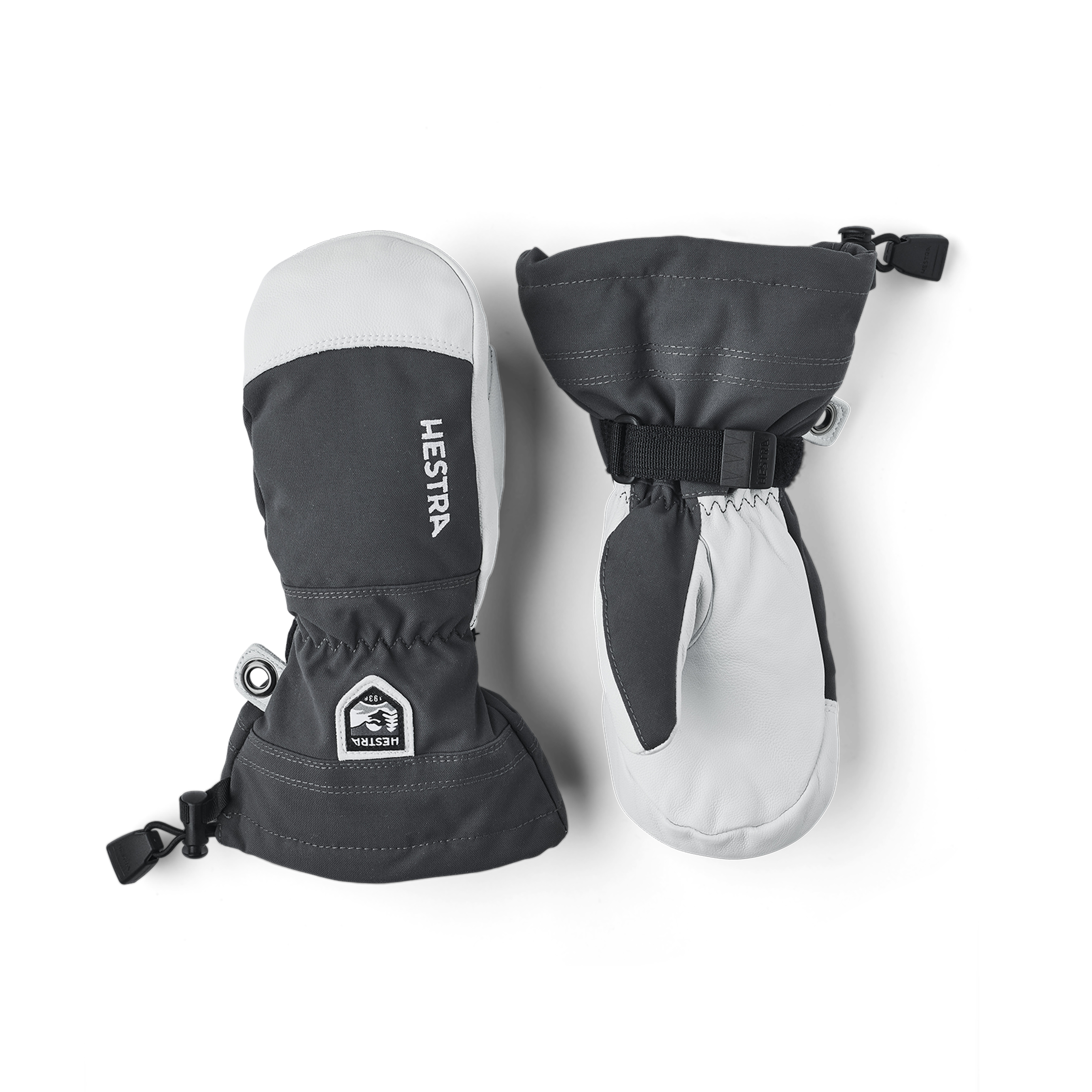 Grauer Fausthandschuh mit weißem Ziegenleder an der Innenhand